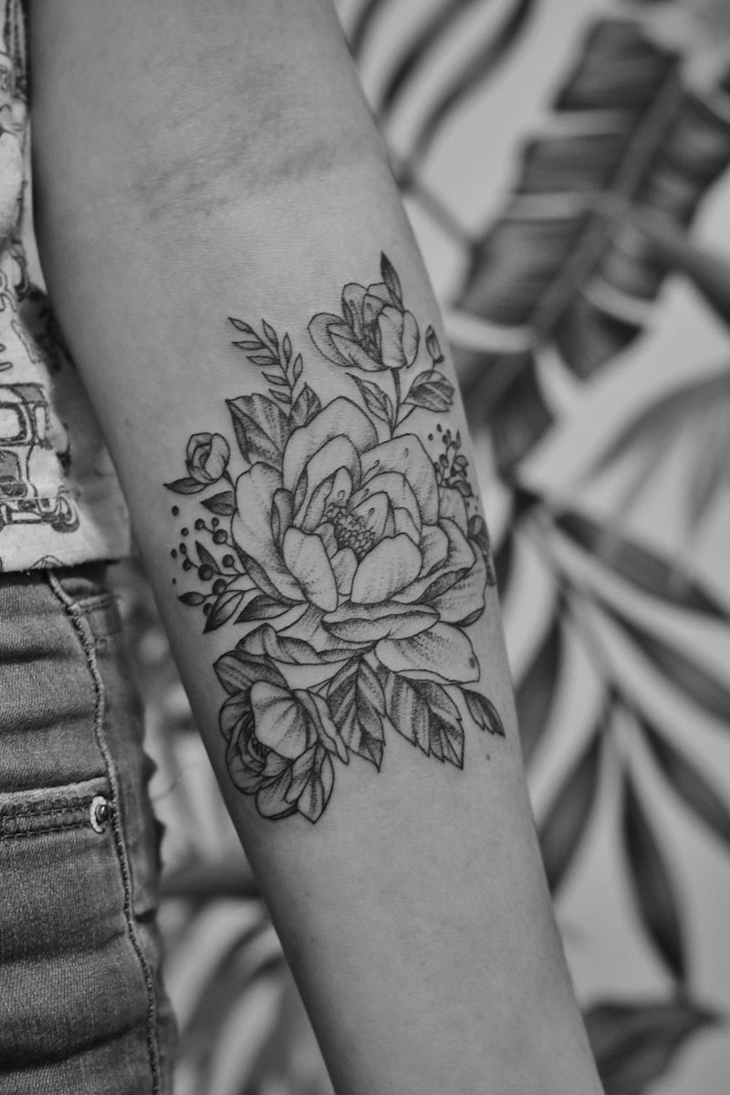 Arm tattoo design by Needle House