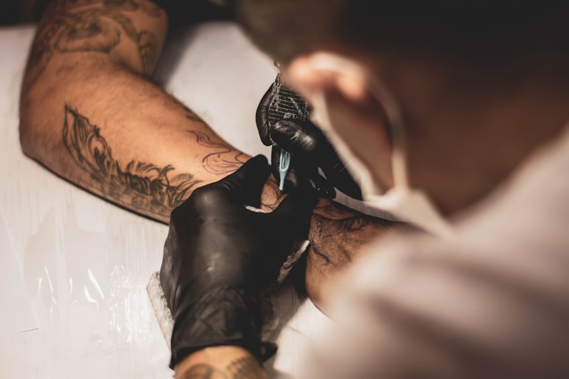 Detailed fine line tattoo by Rayna Dane